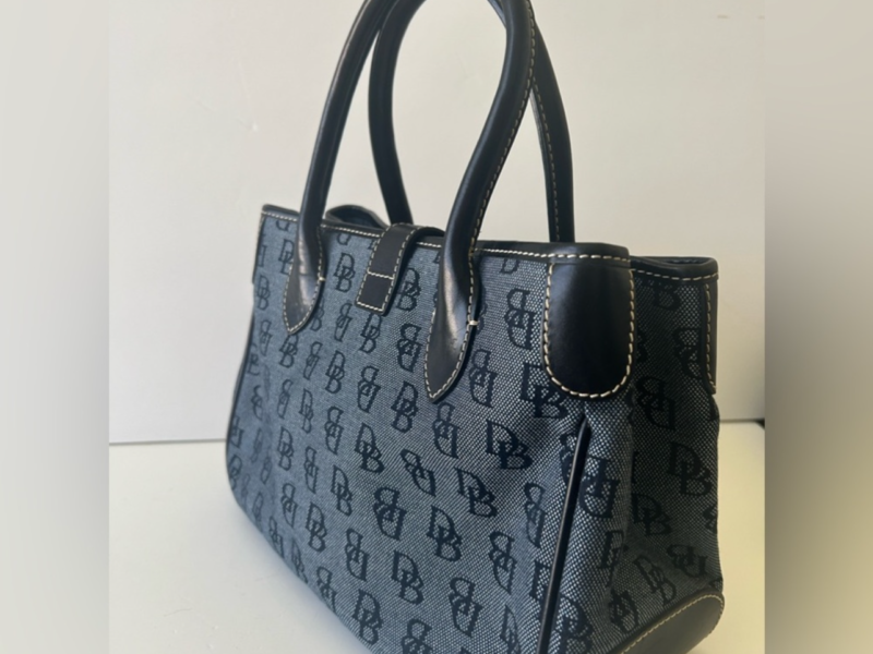 Dooney & Bourke hand bag Monogram black and blue Canvas Light pink inner lining