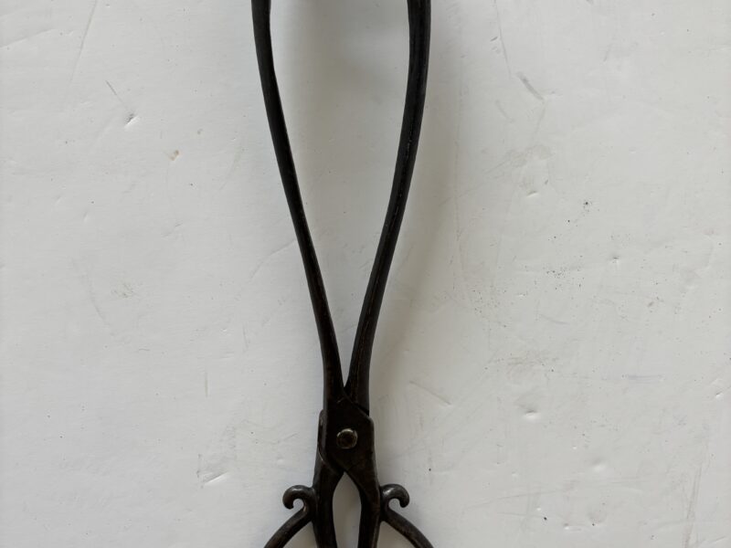 Fireplace metal tongs