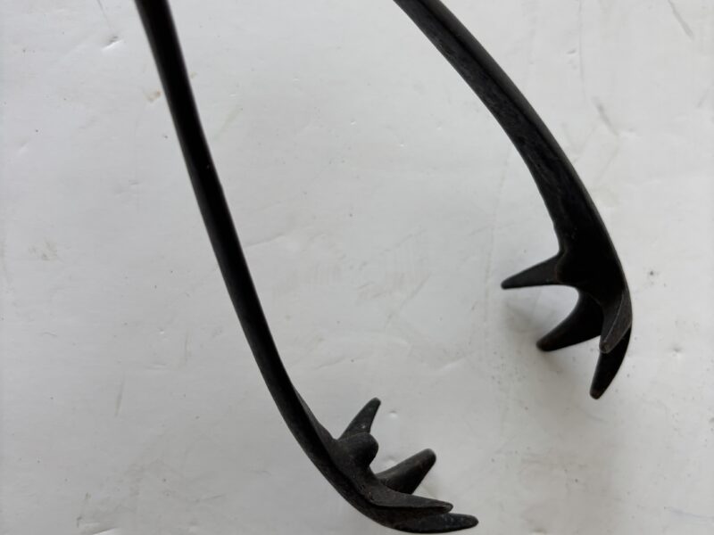 Fireplace metal tongs