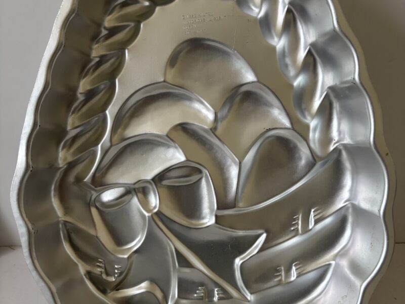 Vintage Easter basket with eggs aluminum baking mold