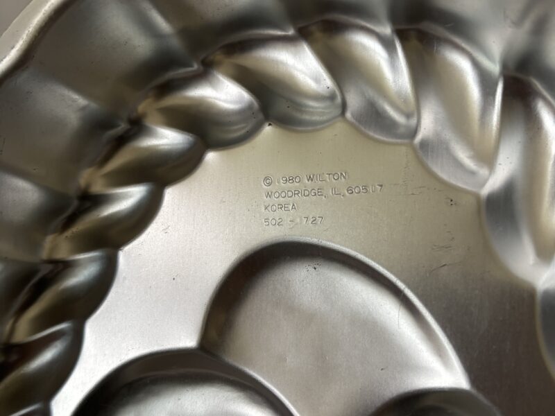 Vintage Easter basket with eggs aluminum baking mold