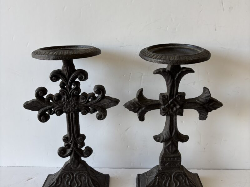 Pair of ornate Fleur de lis cast iron cross candle holders