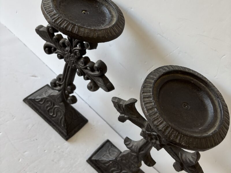 Pair of ornate Fleur de lis cast iron cross candle holders