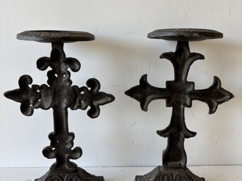 Pair of ornate Fleur de lis cast iron cross candle holders