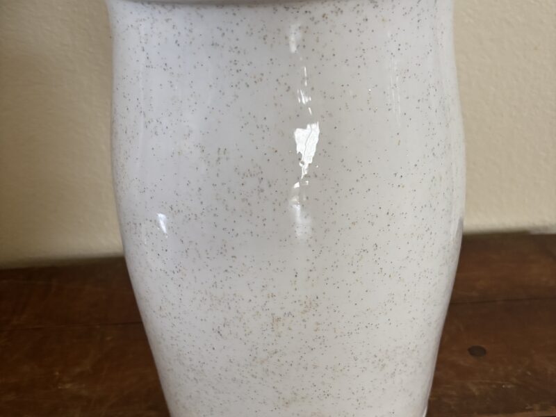 Vintage butter churn with embossed geese highlight decoration