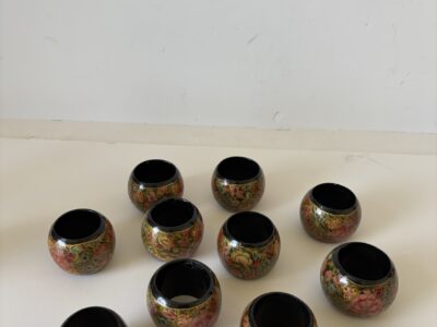 Ten floral napkin rings