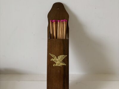 Wooden fireplace wall mount matchstick holder with brass eagle accent