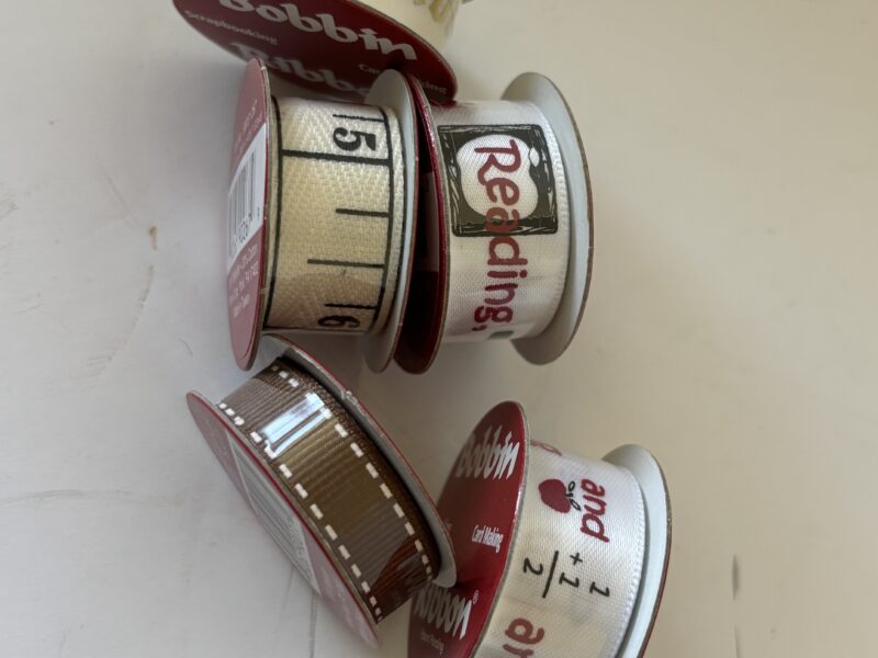 Five scrapbooking bobbin ribbon new or just slightly used