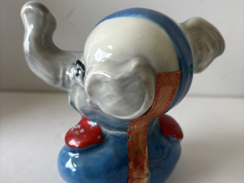 Replacement porcelain elephant head topper Jim Beam football decanter