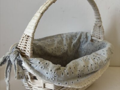 Small white wicker basket with liner