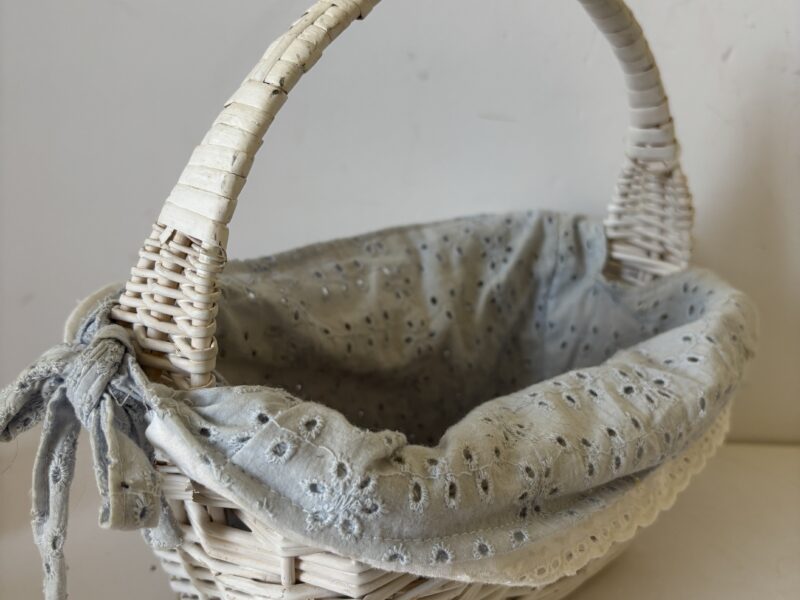 Small white wicker basket with liner