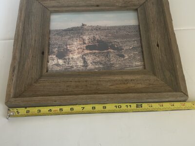 Barnwood frame with natural landscape design