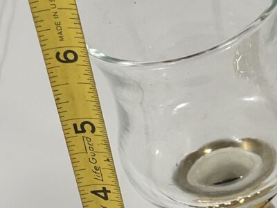 Pair of weighted Baldwin candle holder with glass votive
