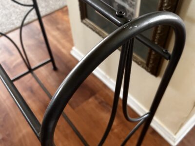 Metal quilt / blanket holder