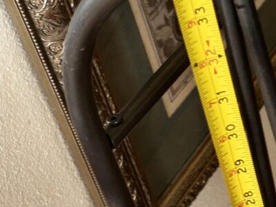 Metal quilt / blanket holder