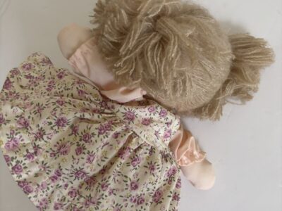 Musical girl doll 9" windup plays it's a small world after all