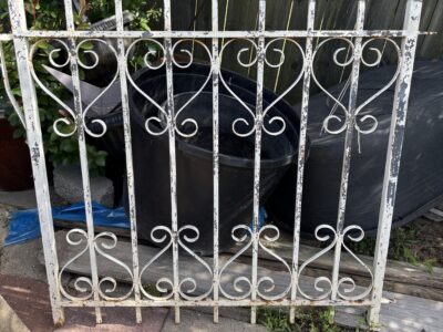 Ornate shabby chic metal fence gate