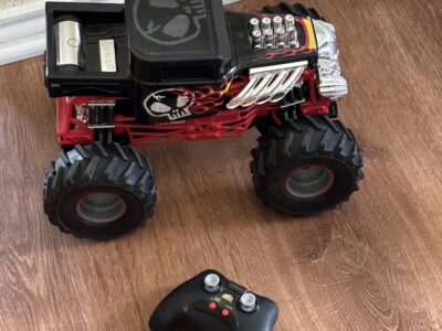 Hotwheels Monster RC Truck by New Bright Red and black with flames design