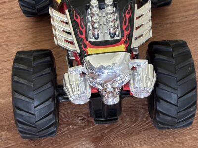 Hotwheels Monster RC Truck by New Bright Red and black with flames design