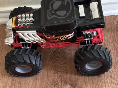 Hotwheels Monster RC Truck by New Bright Red and black with flames design
