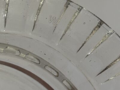 Round glass ashtray with fluted rim marked