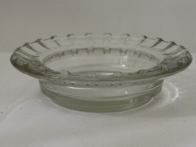 Round glass ashtray with fluted rim marked