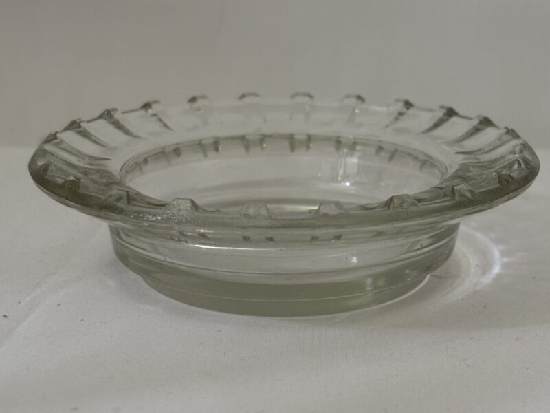 Round glass ashtray with fluted rim marked