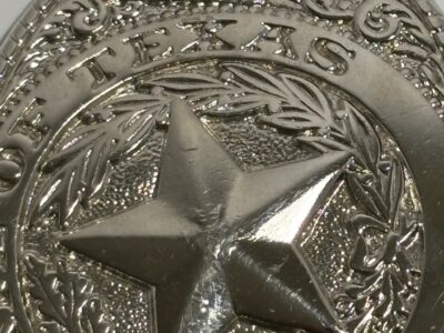 State of Texas silver belt buckle
