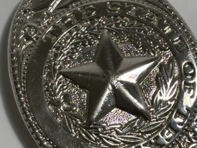 State of Texas silver belt buckle