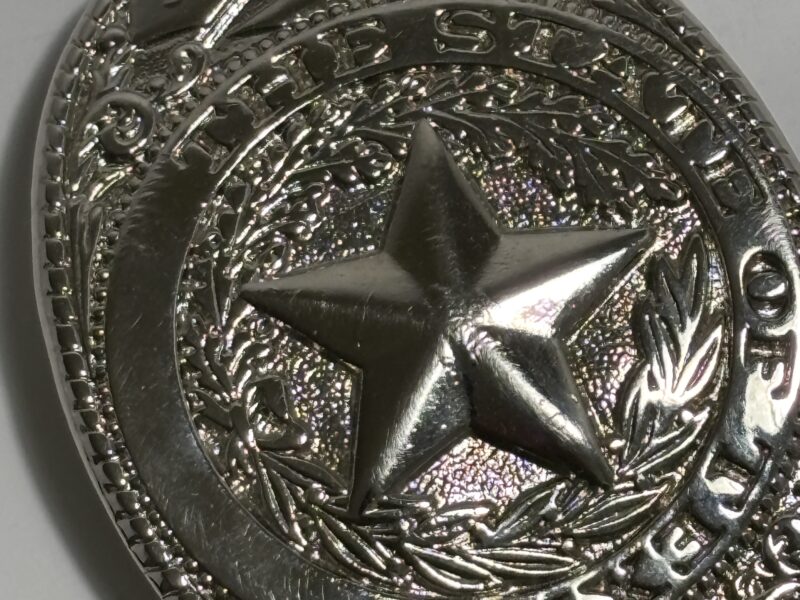 State of Texas silver belt buckle