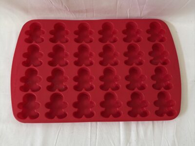 Wilton red silicone 24-cavity Gingerbread Snowman baking mold